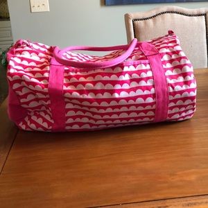 Pink/white duffel bag
